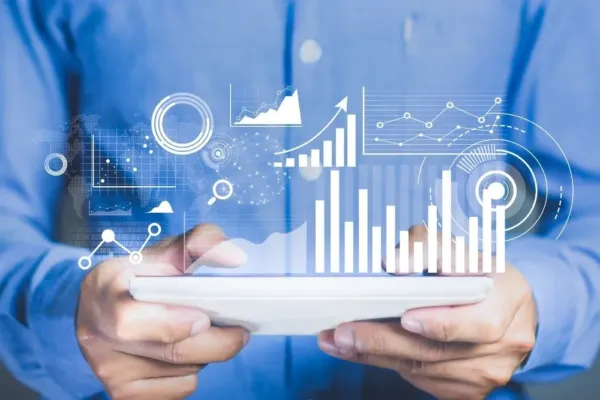 Data being visualized on a tablet by a managed IT professional.