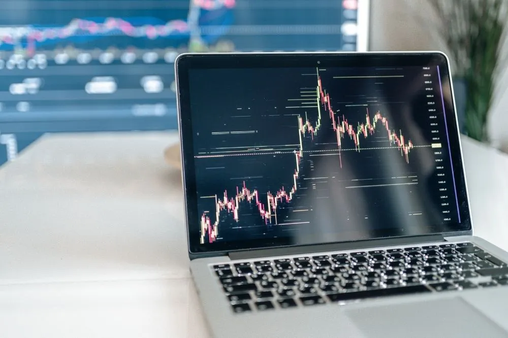 A managed IT computer is alive with positive data projections.