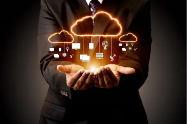 Data being held in the hand of a managed IT professional in a visualization of encryption.