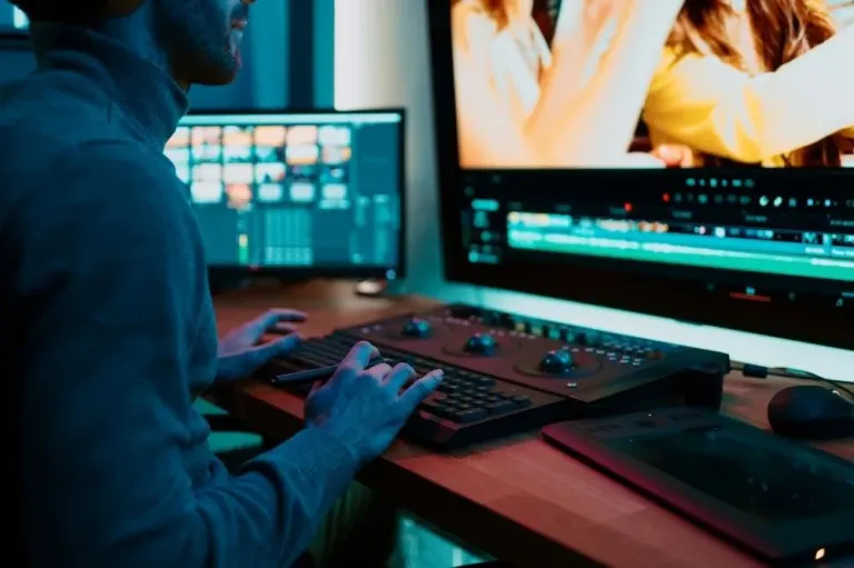 A managed IT professional is working on the computer of a client to get it running tip top.