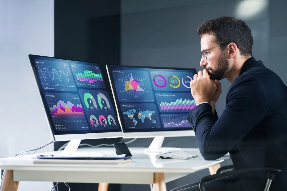 A managed It expert looks over phone system reports data.