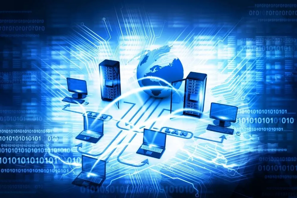 Data aggregation visualized with multiple computers pouring data into one.