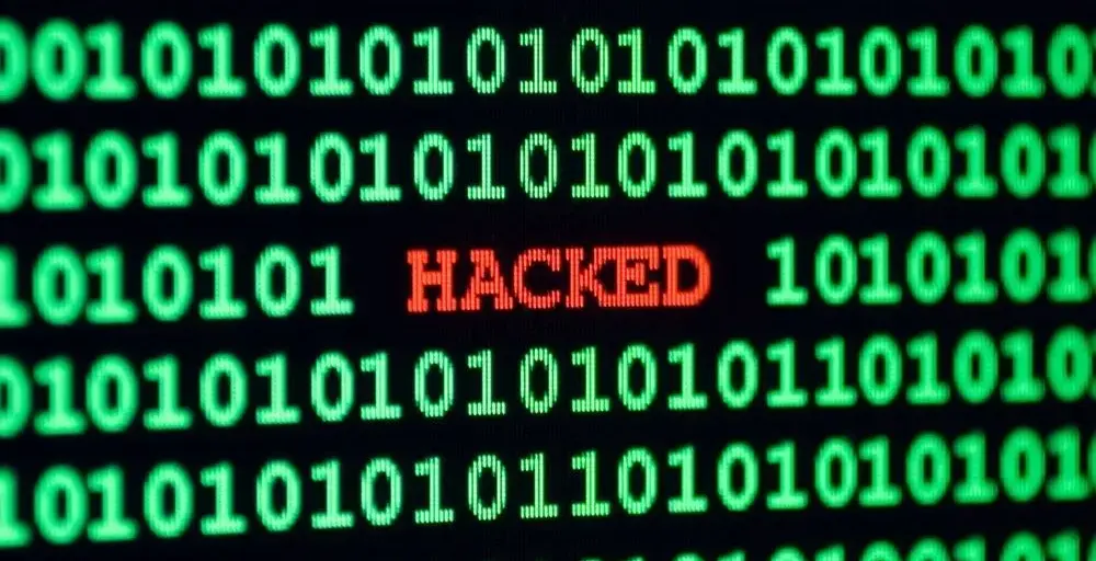 A photo of a computer screen that has been hacked.