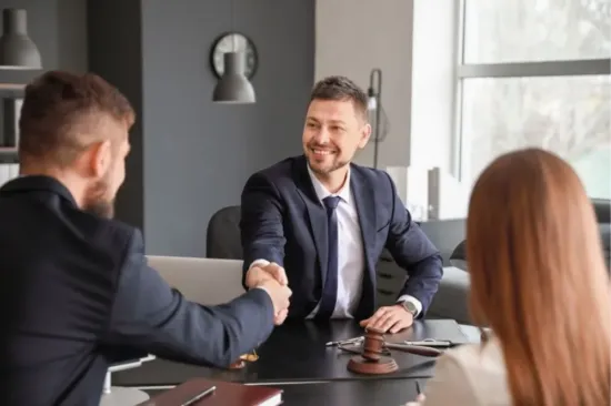 Lawyer and client discussing a case image